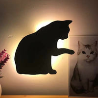 OptiLair cat-shaped acrylic wall night light with warm yellow sound-sensor illumination for bedroom decor