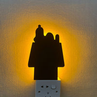OptiLair cartoon dog silhouette night light with warm yellow glow, acrylic sound-sensor plug-in lamp for bedroom