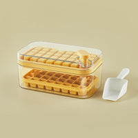 OptiLair yellow one-button press ice cube tray with storage box, lid, and scoop for easy kitchen ice production.